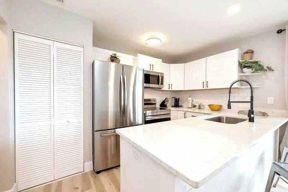 Our kitchen area is perfect for eating in during your stay at "So Fire, So Good".