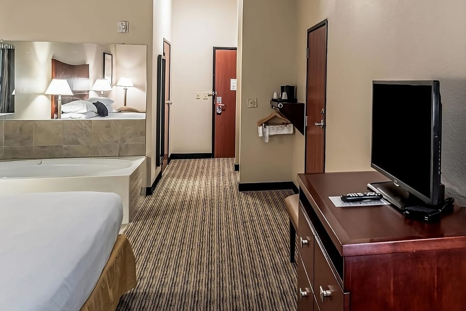 Refresh at a spotless vanity with bright mirror lighting.
