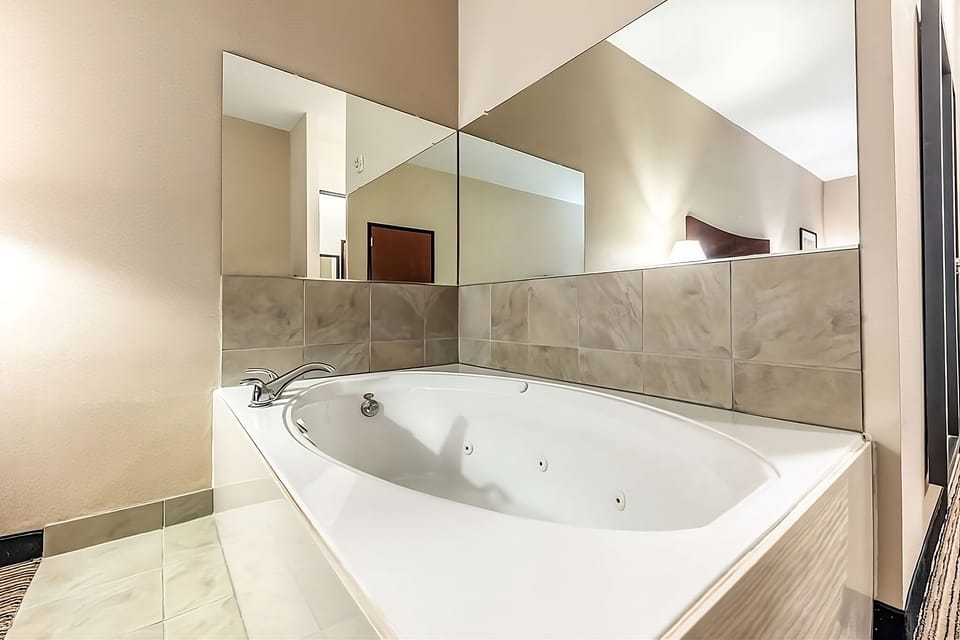 Stretch out in a spacious room with desk and lounge chair.