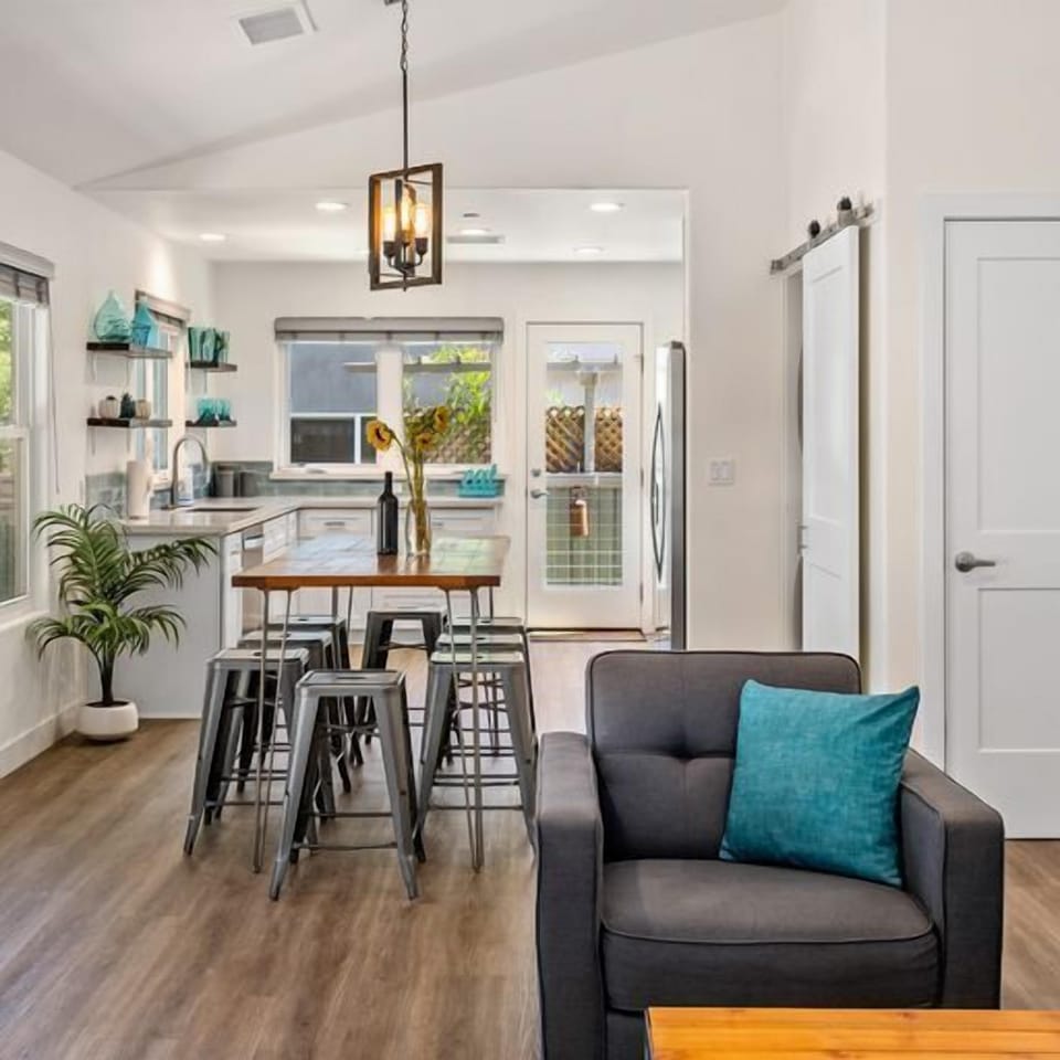 Bright and light view from living room to kitchen