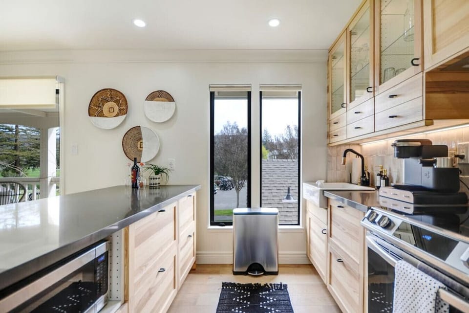 All your cookware, bakeware, and utensils are here. This sleek kitchen is made ever sleeker with camouflaged refrigerator and dishwasher.