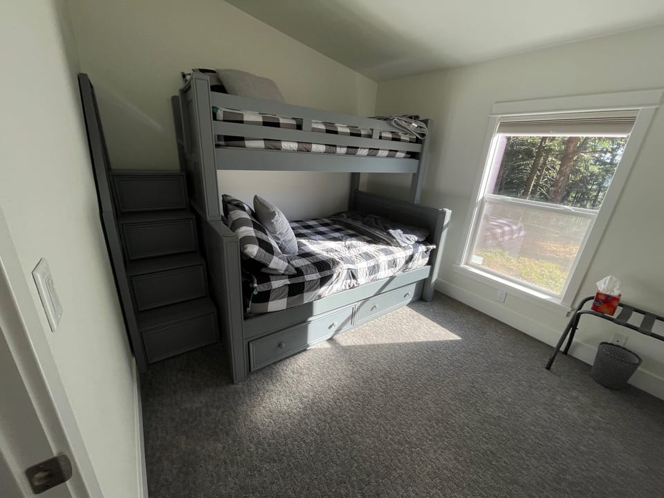 Bunk-bed, bedroom 2. Twin on top, full on bottom. Has stairs, not ladder. 