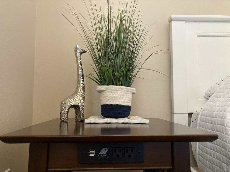 Second bedroom nightstands both have a built in charging station!