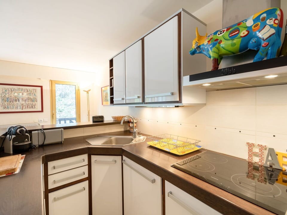 Cabinetry, Countertop, Wood, Interior Design, Sink, Kitchen, Picture Frame, Kitchen Stove, Kitchen Sink, Wall