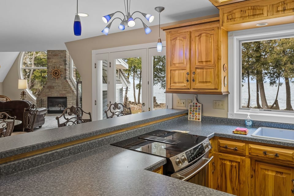 Kitchen opens to living area, perfect for gathering