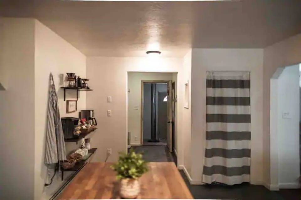 View from kitchen sink towards entryway