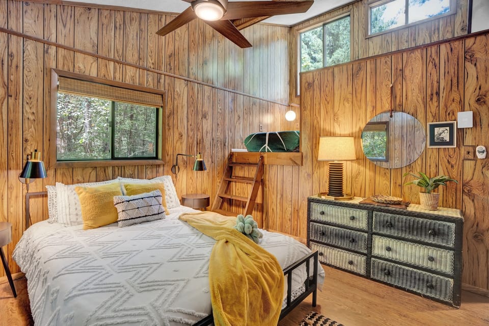 Drift off to sleep in the plush queen-sized bed and wake up to the soft morning light coming through the wide windows.