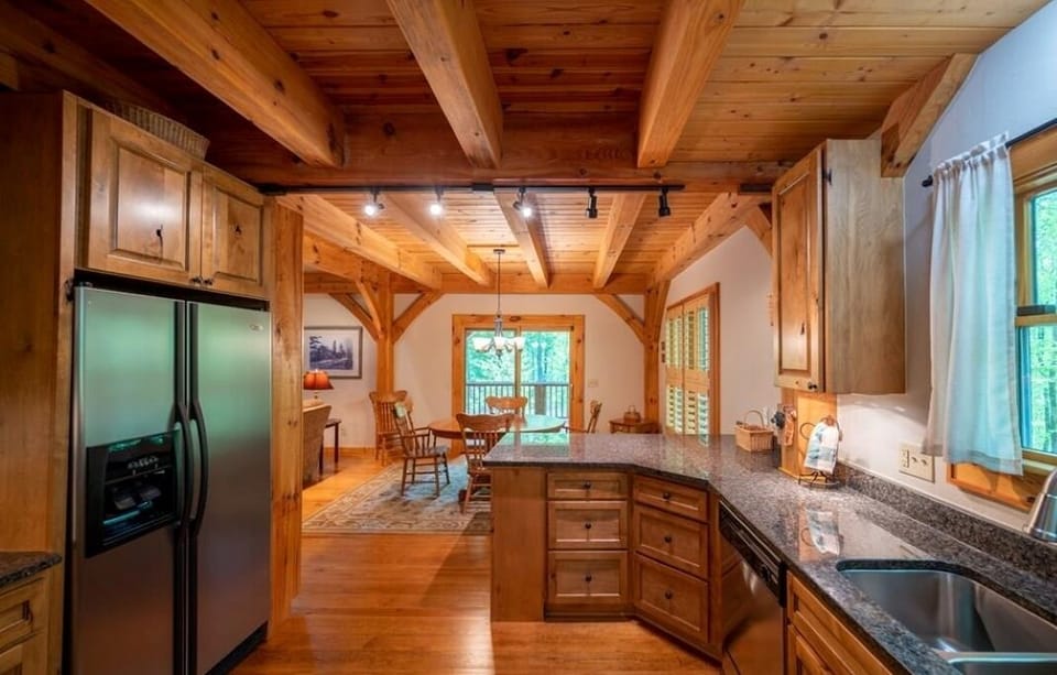 Fully equipped kitchen with granite counter tops and stainless steel applicances