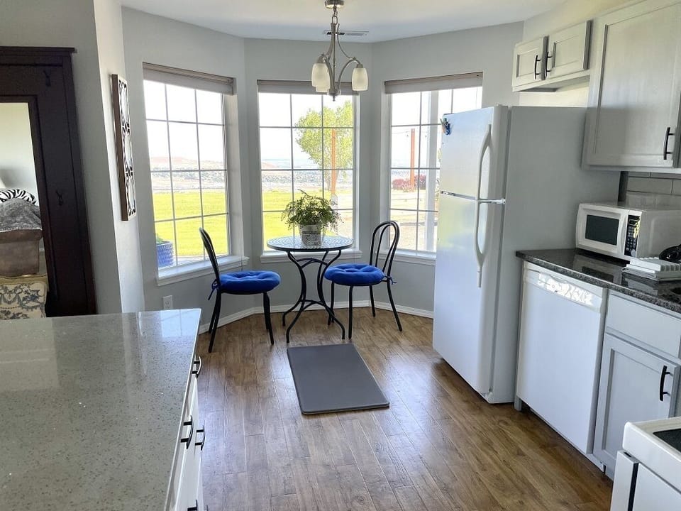 View of breakfast nook through the kitchen.