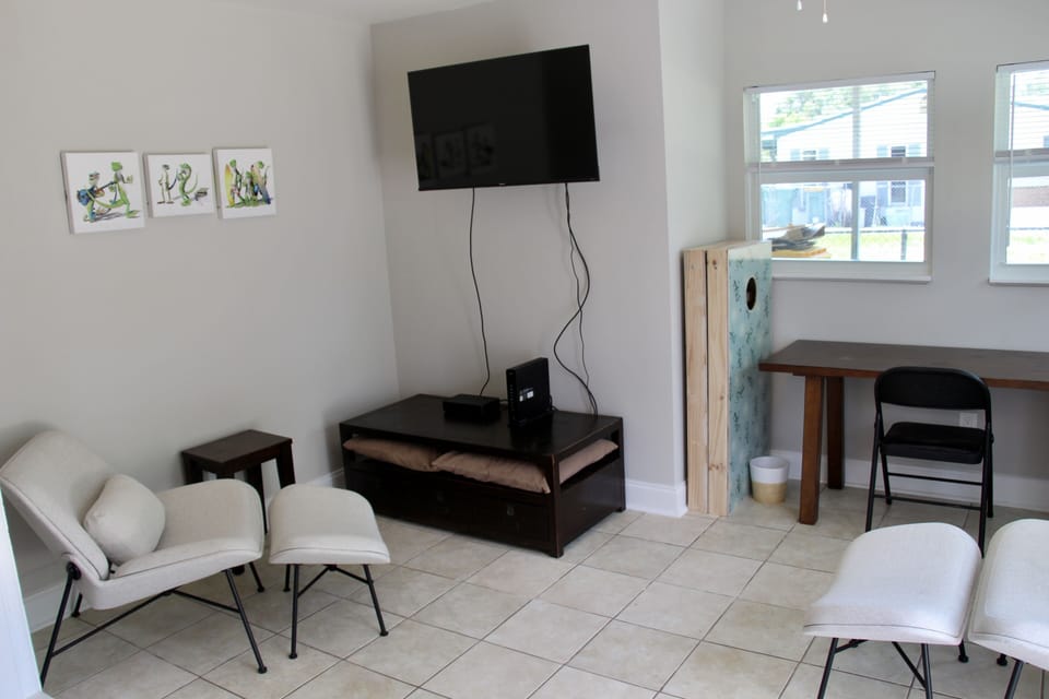 Bonus Room.  Open and off of Master Bedroom and exits to backyard.