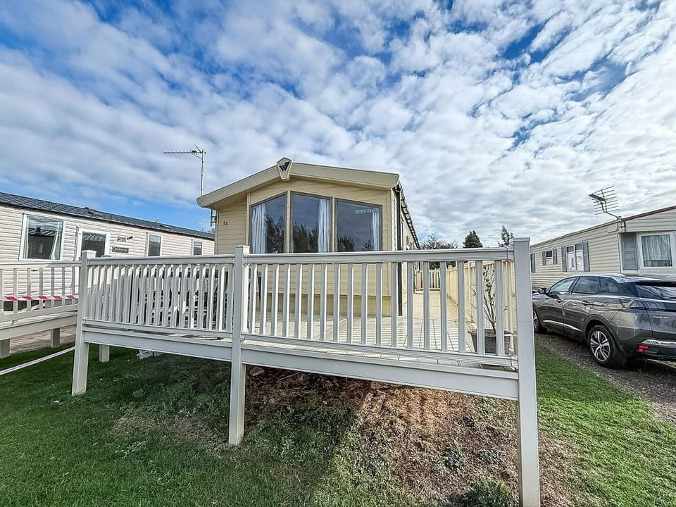 Sunlit deck with panoramic sky views for relaxing outdoors