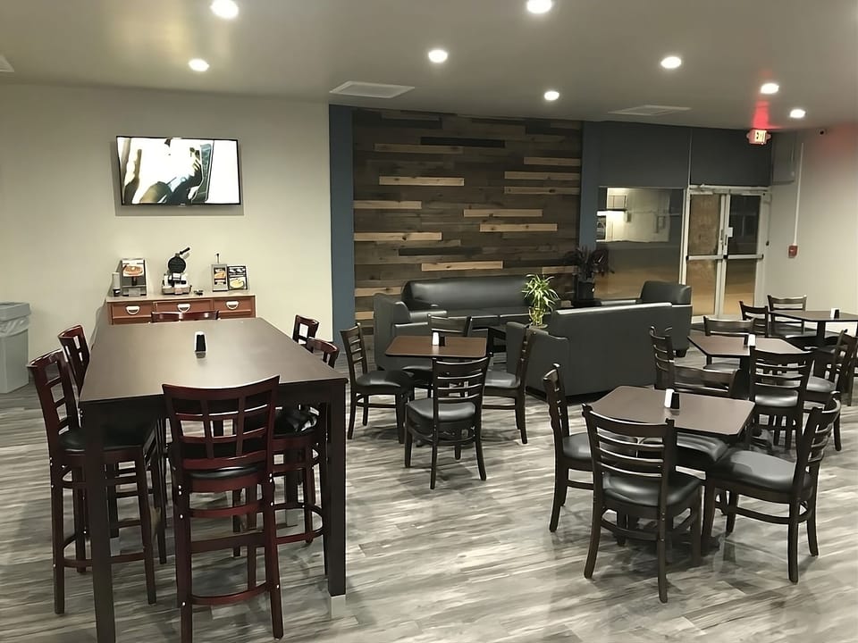 Gather for relaxed conversation in this modern, comfy lounge.