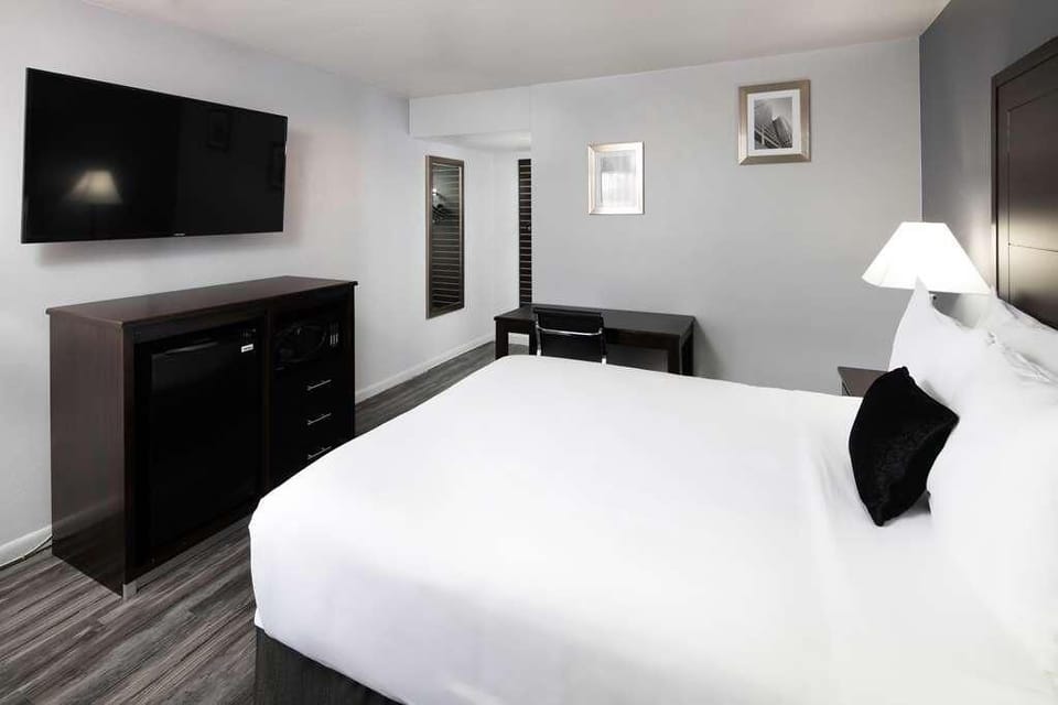 Kick back with a wall-mounted TV and streamlined modern finishes.