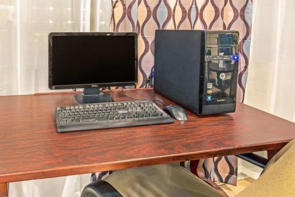 Catch up on emails comfortably with a dedicated in-room workspace.