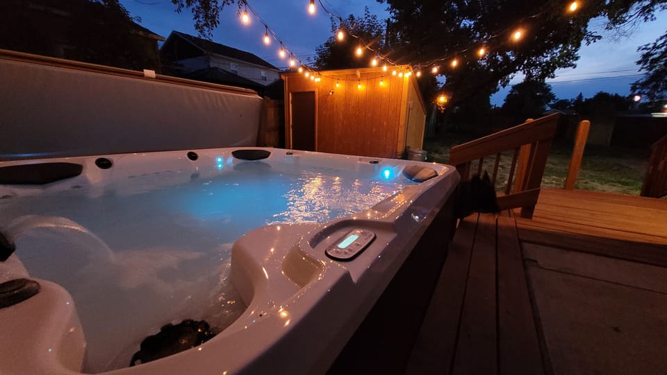 Hot tub with Blue Tooth speakers, string lights and dry sauna 