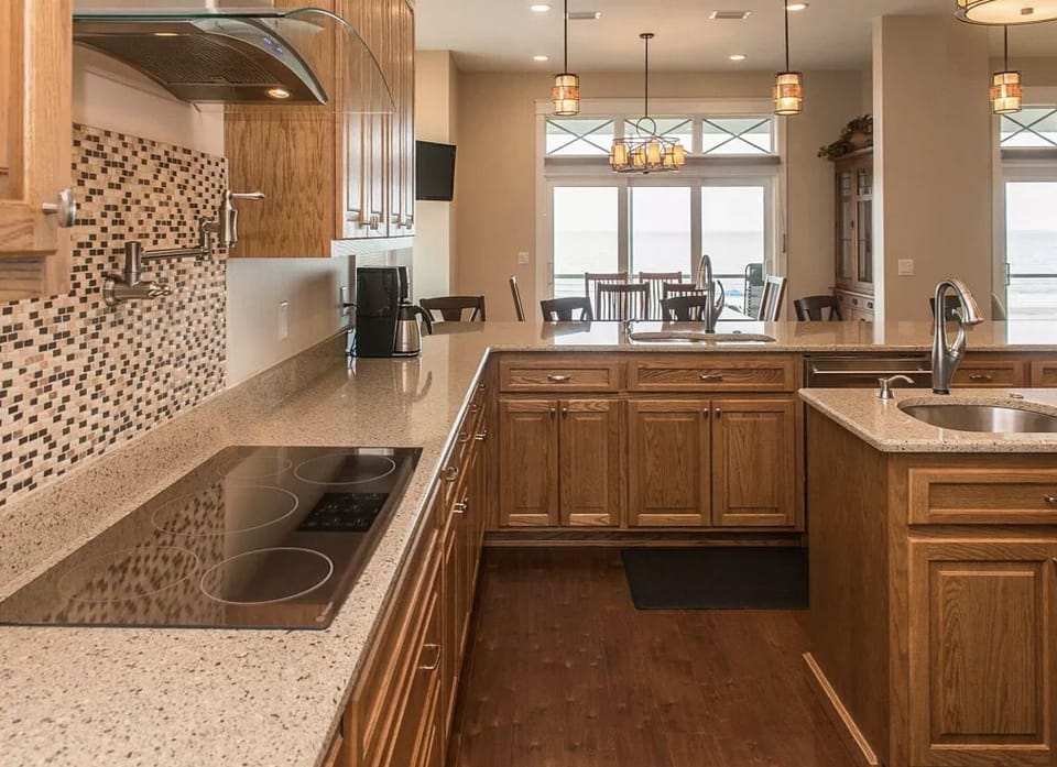 Kitchen equipped with toaster, blender, crock pot, k-cup & regular coffee maker