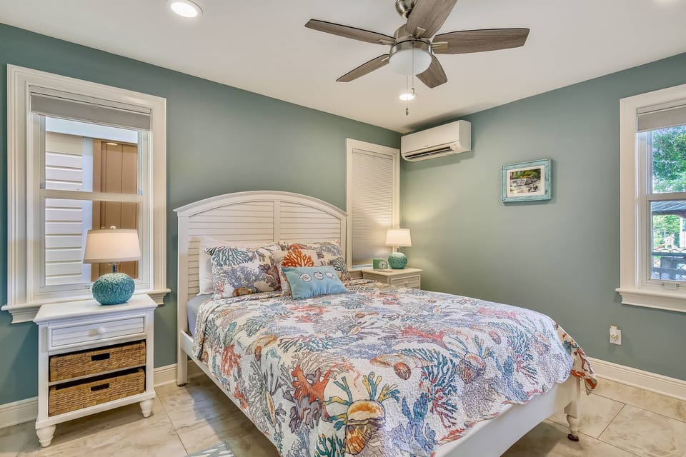 Primary bedroom features a queen bed.