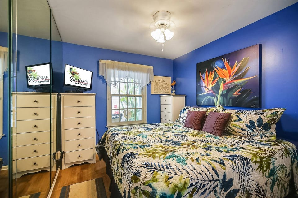 Primary bedroom features a king bed.