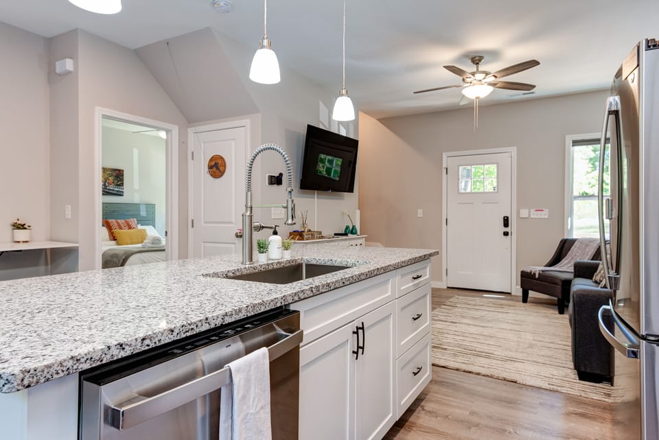 Kitchen, dinning, and living room open floor plan.