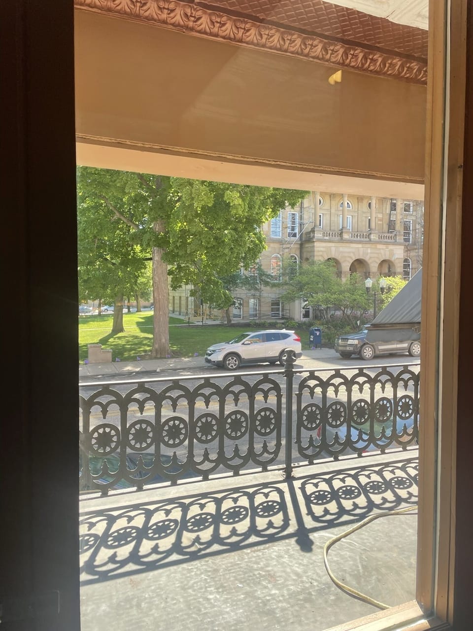 Balcony looking out at courthouse.