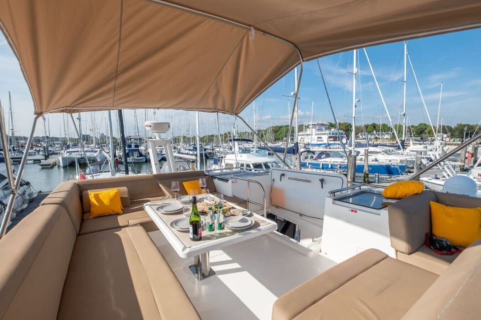 The flybridge puts you right inside the view over Lymington marina.
