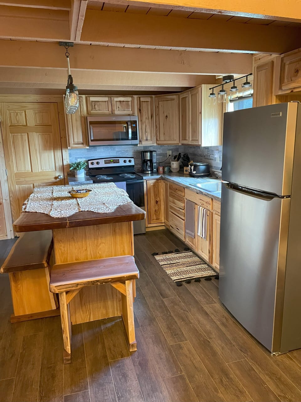 Large full size fridge for multiple family food storage.