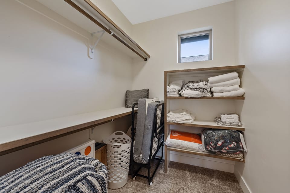 Master closet with a lot of room for storage. 