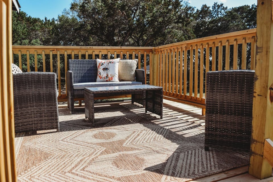 Back patio w BBQ pit below