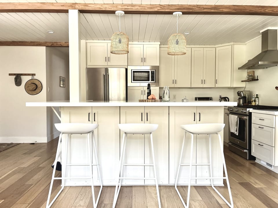 Breakfast bar adjacent to the kitchen.