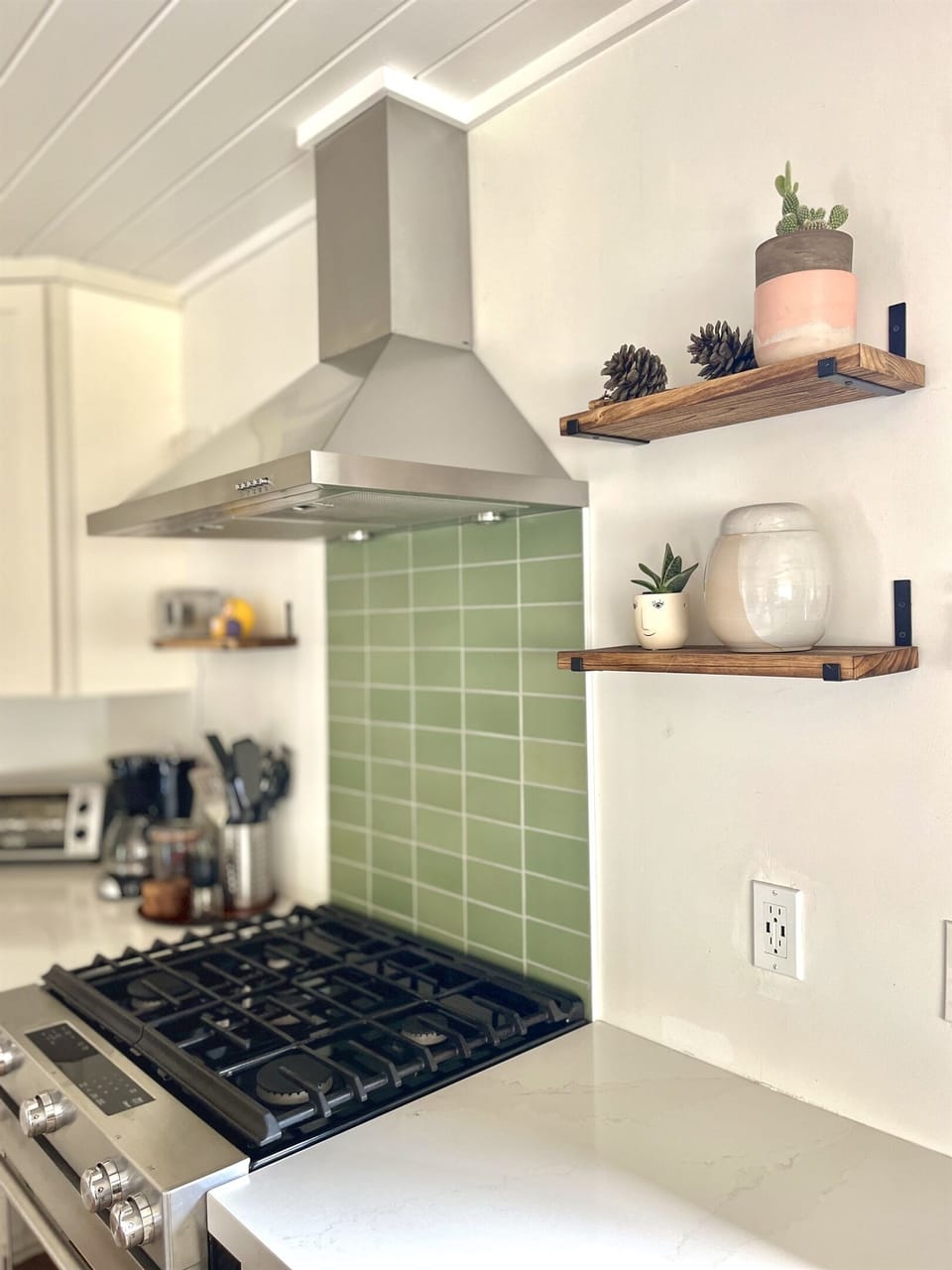 Heath ceramic tiles above the stove.