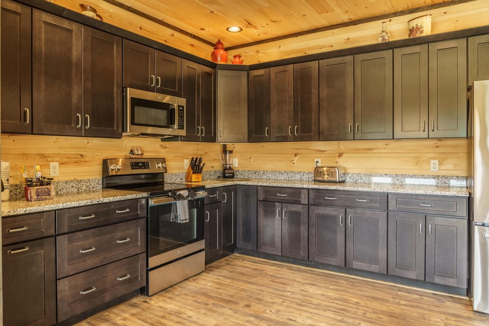 Large kitchen with plenty of space and supplies. 