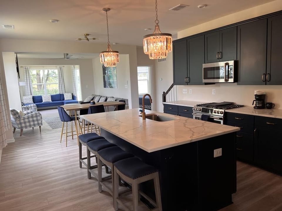 brand new state of the art kitchen with GE Cafe Appliances.