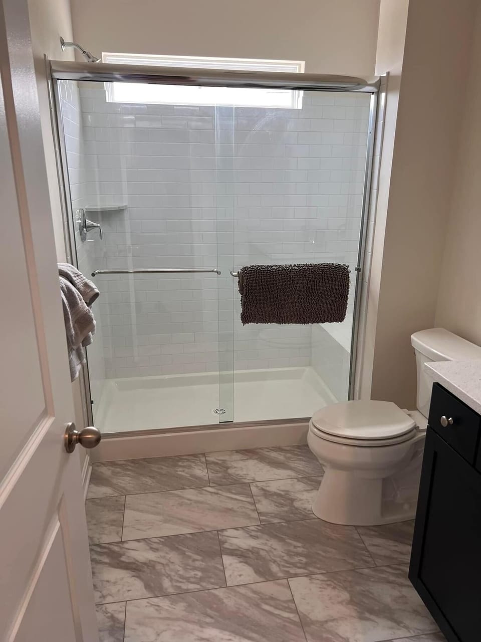 Hall bath and shower for Bedrooms 4 and 5. 