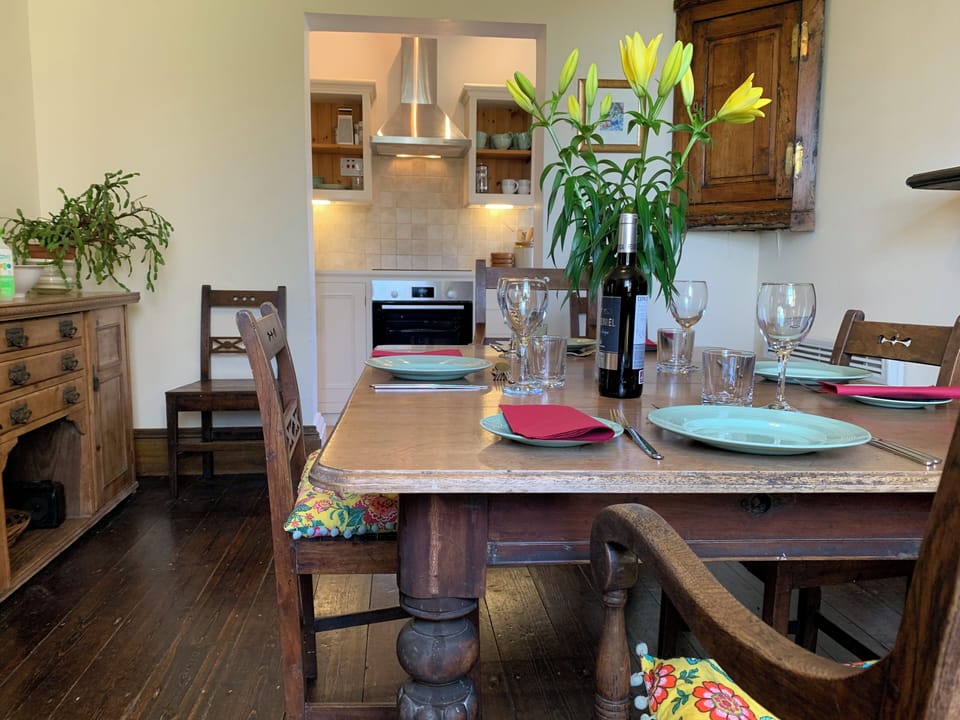 spacious dining room and galley style kitchen