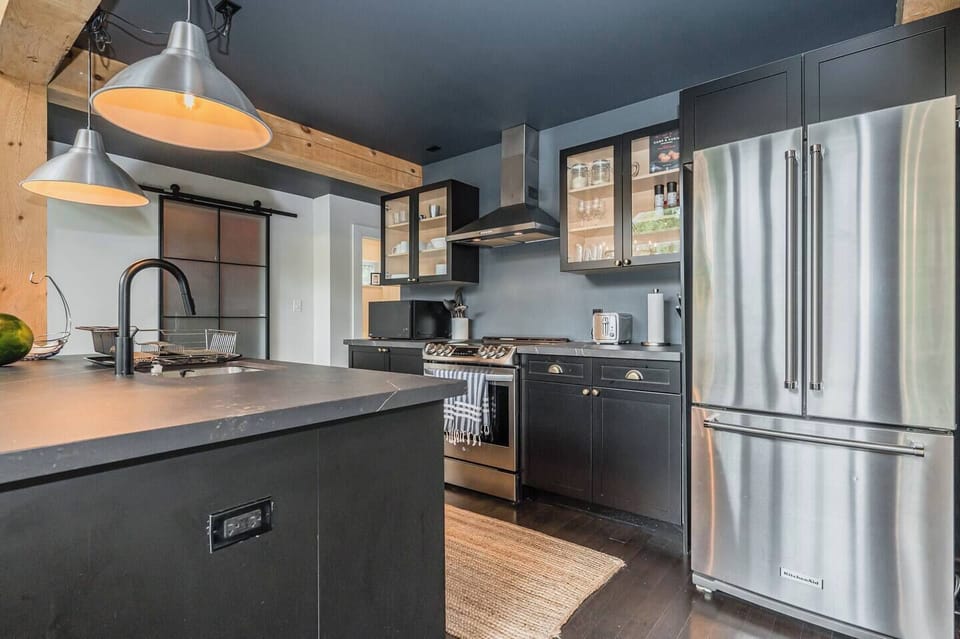 The kitchen island provides a quick and convenient way to prepare meals and entertain. 
