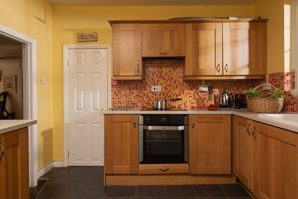 The oven, hob and pantry - Pump Cottage