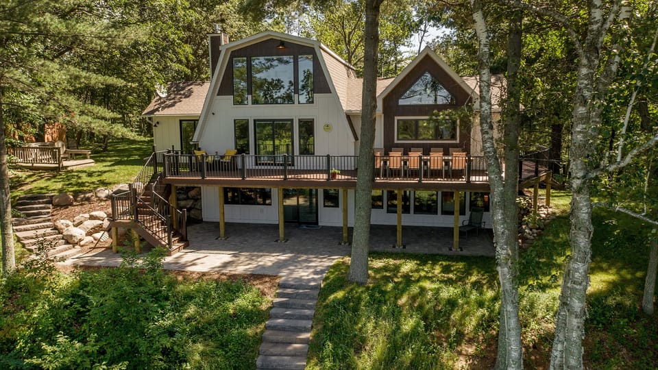 View from the beach side of property. Wraparound deck and lower patio.