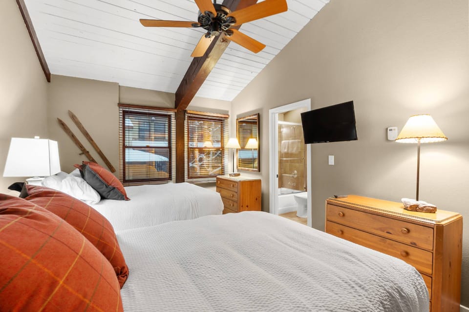 Upstairs you will find two bedrooms, each with 2 full size beds, an en-suite bath and flat screen TV.