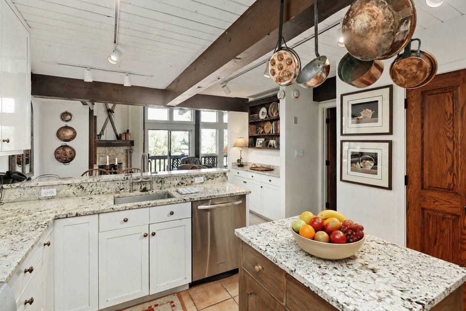 A warm and welcoming color palate and furnishings create an inviting space to call home during your stay in Snowmass.