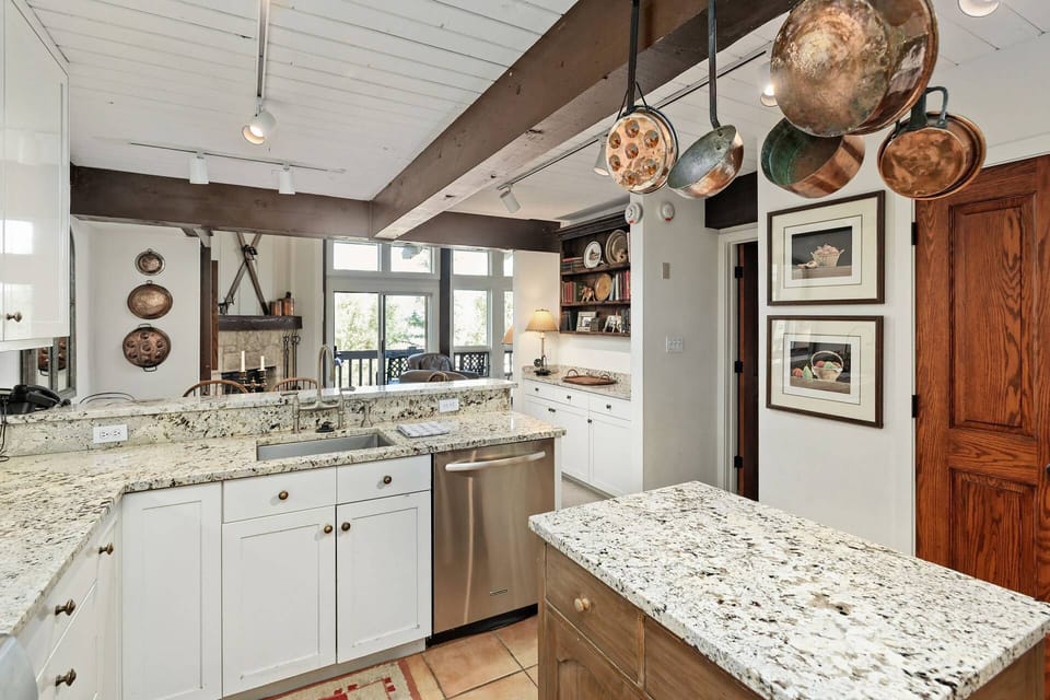 A warm and welcoming color palate and furnishings create an inviting space to call home during your stay in Snowmass.