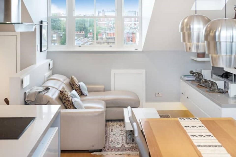 Lounge area with large Smart TV and 'surround sound' home theatre system