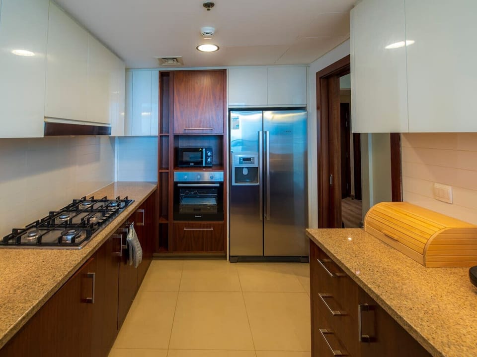 Kitchen Delight: Modern design meets functionality with sleek appliances and elegant finishes!