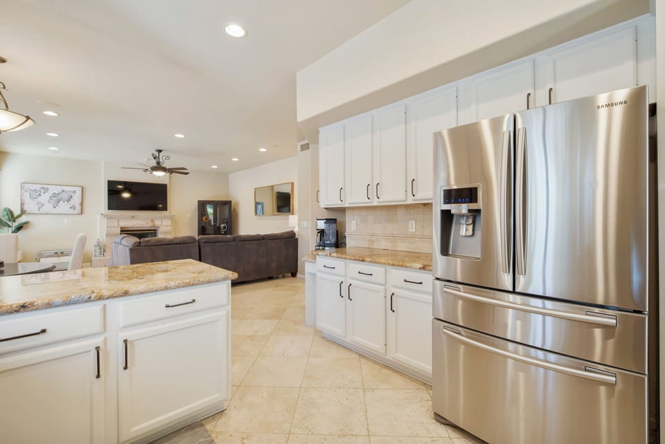 Fully stocked w/ stainless steel appliances & everything needed for cooking.