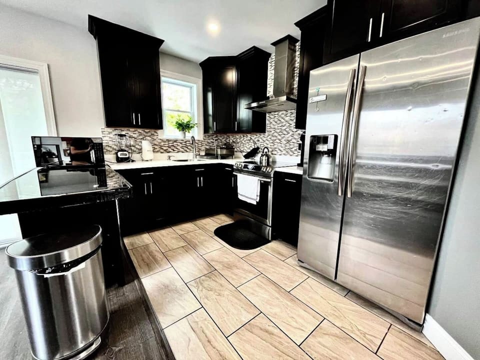 Fully Stocked Kitchen: Our kitchen is fully equipped with all the essentials you need to prepare and enjoy meals, including modern appliances, cookware, utensils, and more.