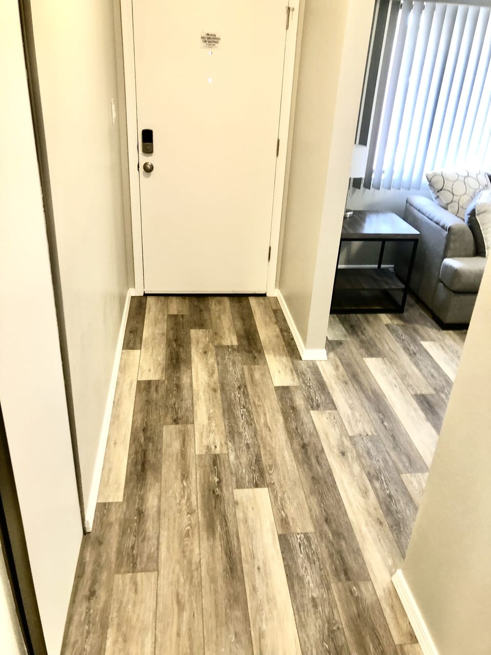 Wide entryway with coat closet. High chair and pack in play located in closet