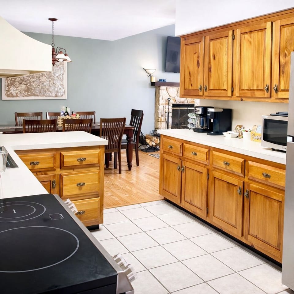 Stocked  kitchen with counter top ice maker, and Keurig and drip coffee makers