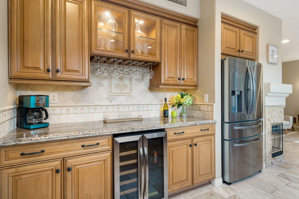 Updated appliances, including refrigerator, beverage fridge and dishwasher