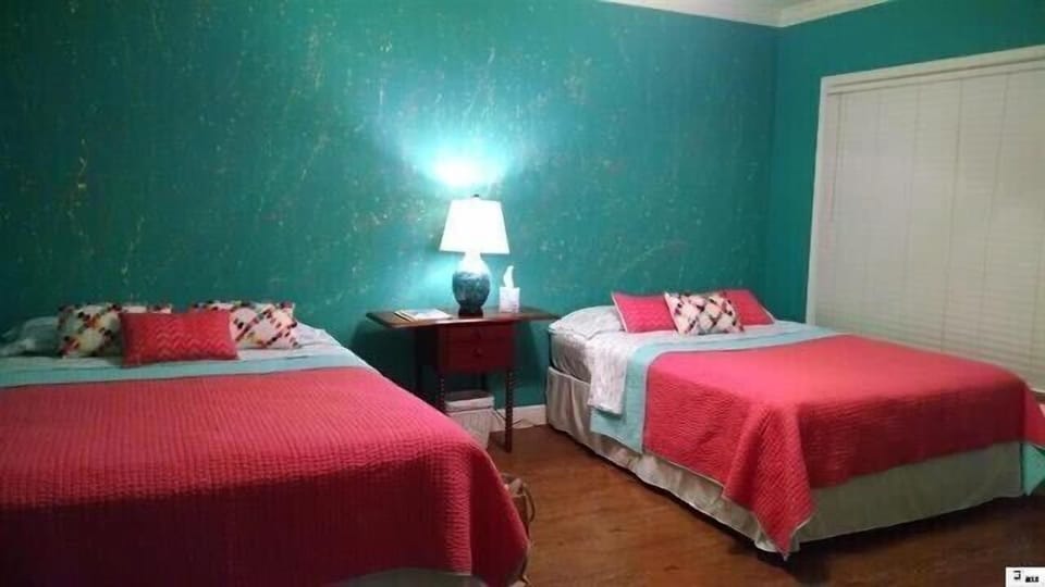 Back bedroom with queen beds