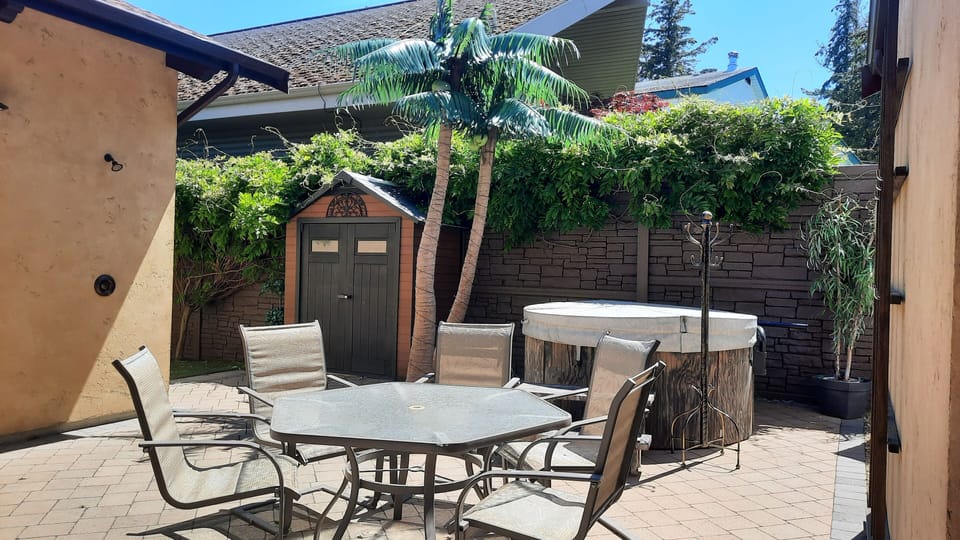Private outdoor dining area,  hot tub and outdoor shower.  