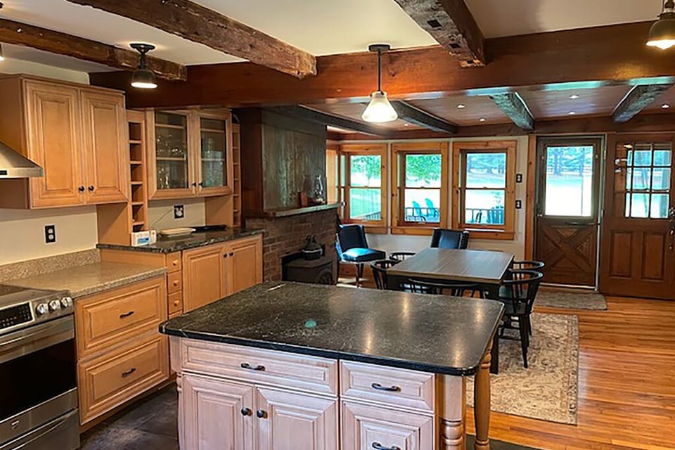 Dinning room & Kitchen. Original exposed beams.